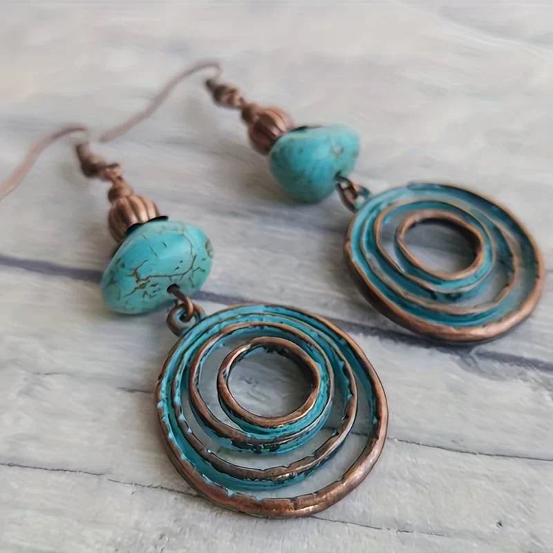 Kolczyki Boho miedziane spirale z prawdziwym turkusowym kamieniem