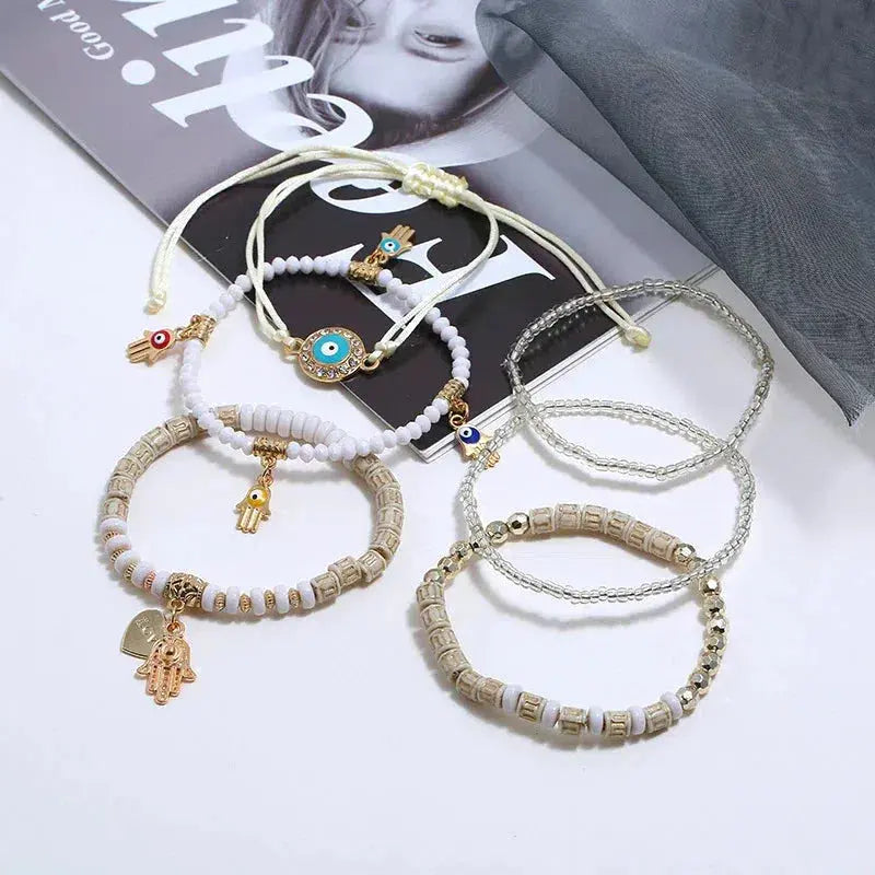 Boho zestaw bransoletek z okiem proroka, hamsą i perłami