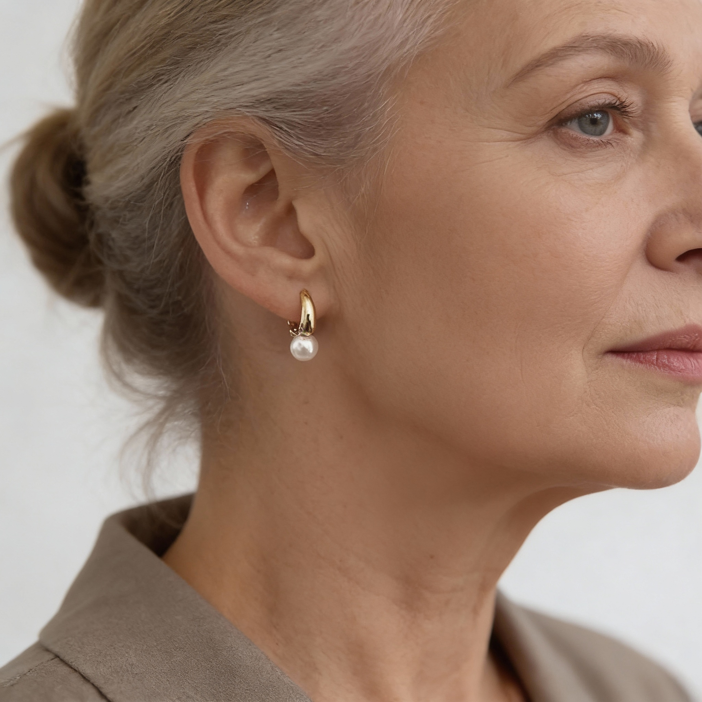 Eleganckie kolczyki z zawieszką perłą na ponadczasowy look