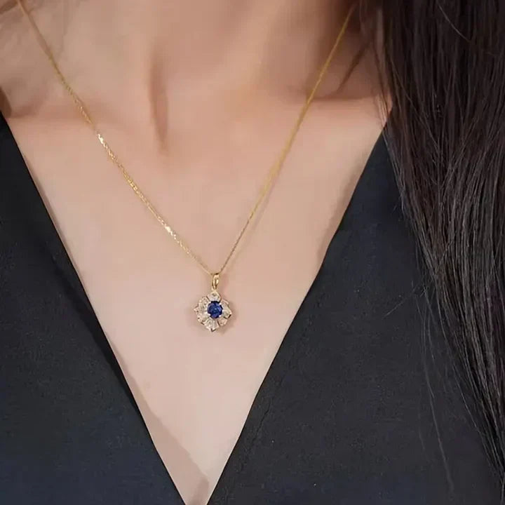 Elegancka zawieszka szafir z brylantami i delikatnym łańcuszkiem