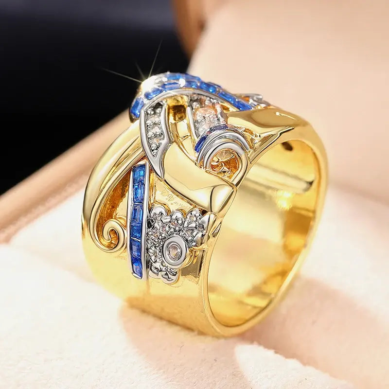 Elegancki złoty pierścionek z szafirem i diamentami w stylu vintage