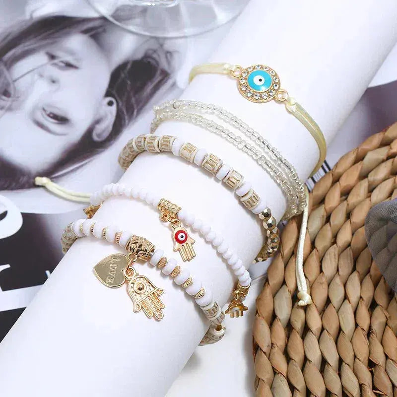 Boho zestaw bransoletek z okiem proroka, hamsą i perłami