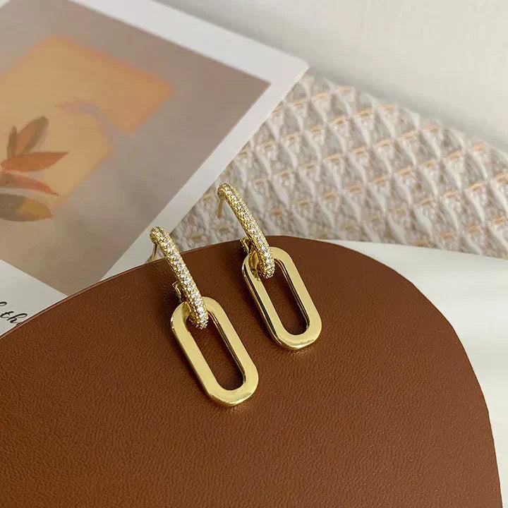 Mieniące się kolczyki koła z eleganckimi owalnymi zawieszkami – stylowe kolczyki