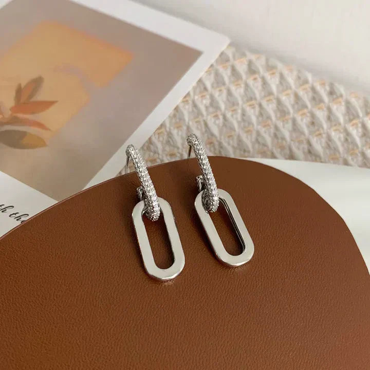 Mieniące się kolczyki koła z eleganckimi owalnymi zawieszkami – stylowe kolczyki