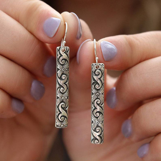 Kolczyki Boho chic z kwiatowym i falistym designem