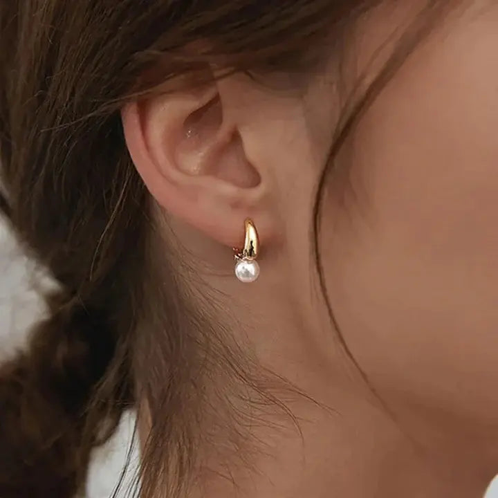 Eleganckie kolczyki z zawieszką perłą na ponadczasowy look
