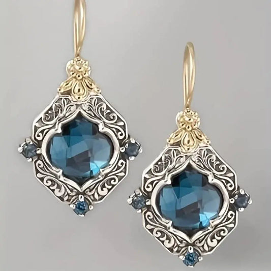 Antyczne kolczyki niebieski topaz z kwiatowym designem vintage