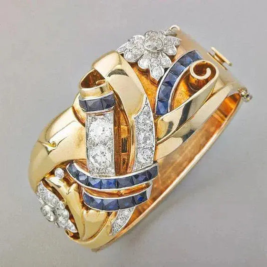 Elegancki złoty pierścionek z szafirem i diamentami w stylu vintage